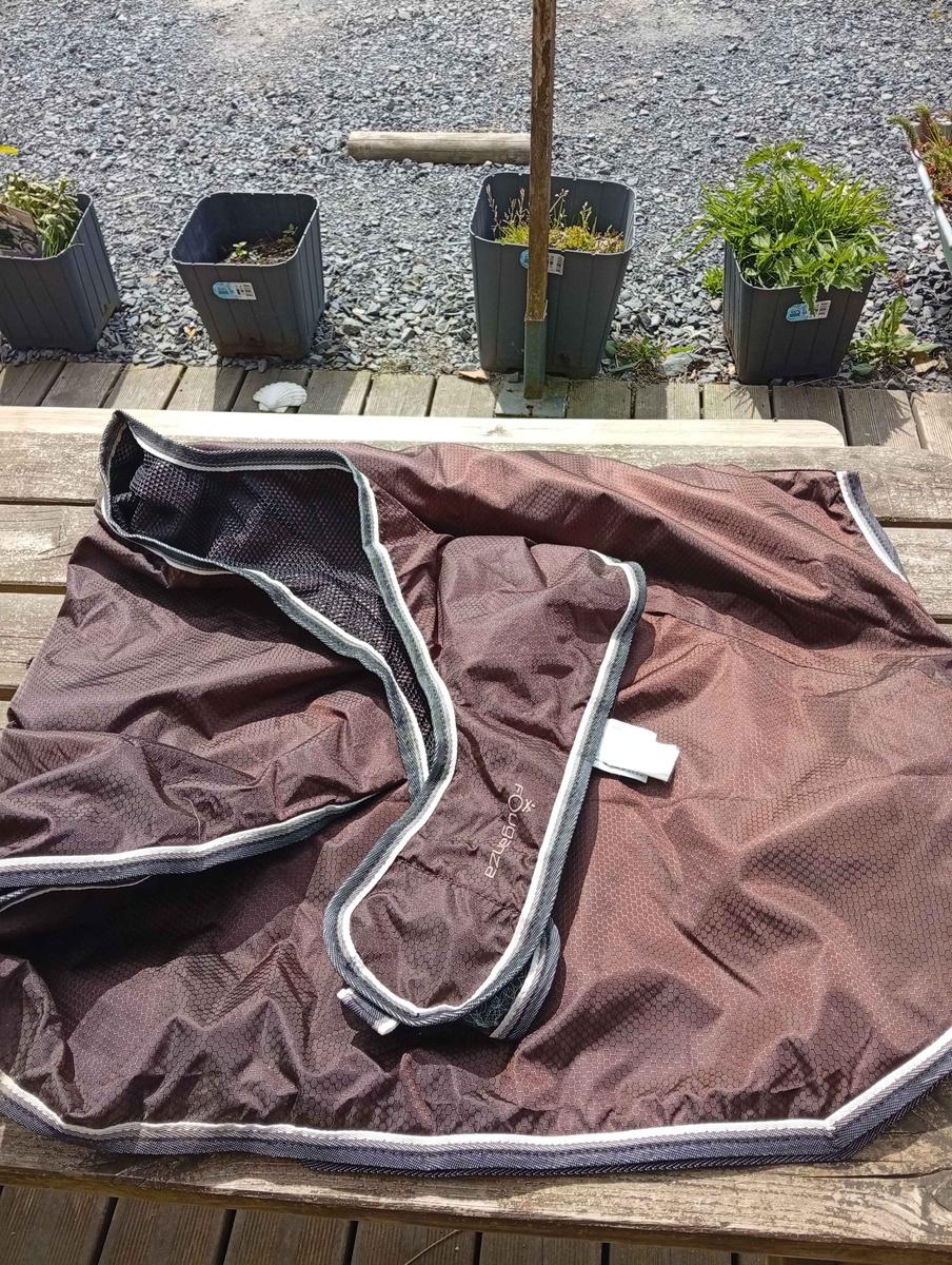 couvre reins imperméable marron liseré beige/marron