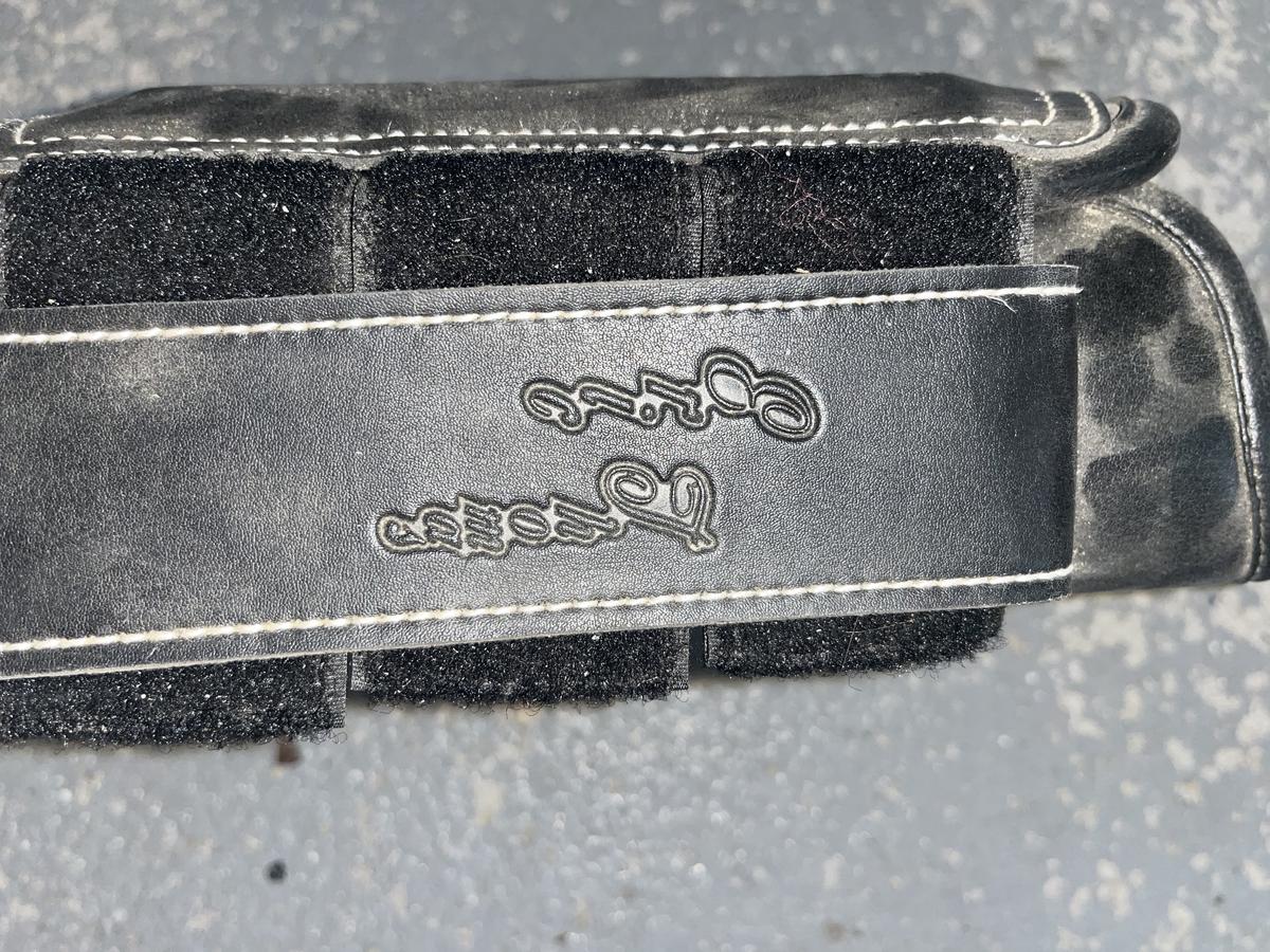 Guêtres de dressage en cuir noir