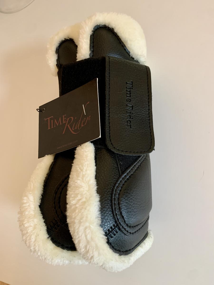 Ensemble guêtres protèges-boulets noir et mouton Time Rider taille M